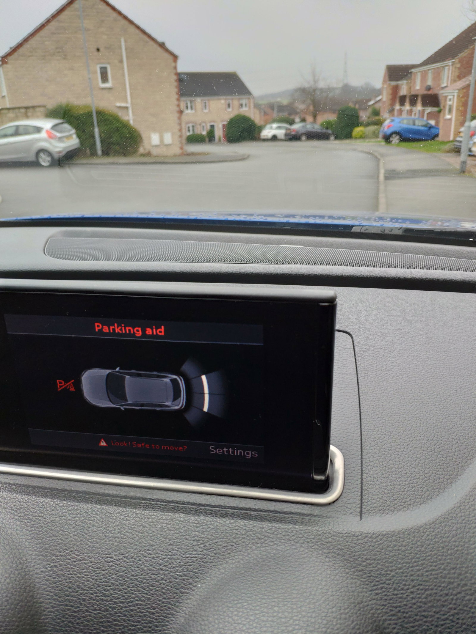 Front parking sensors constantly alerting me and not working