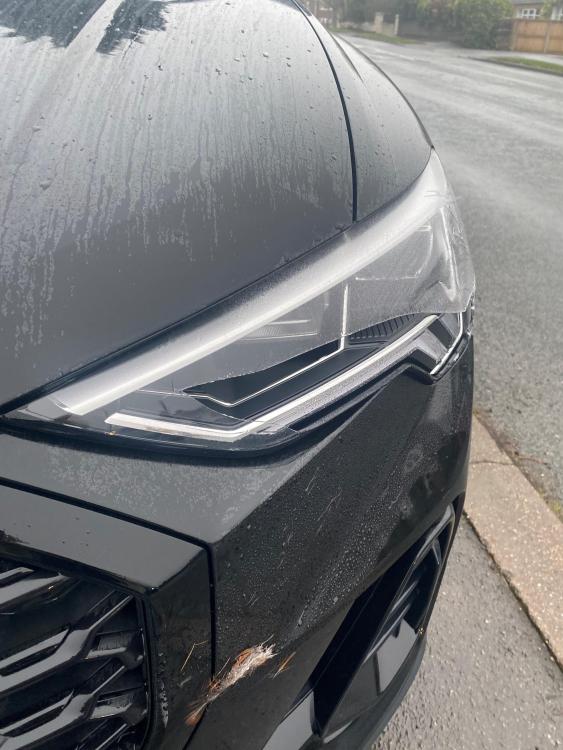 Audi Damaged Headlight Lens.jpg